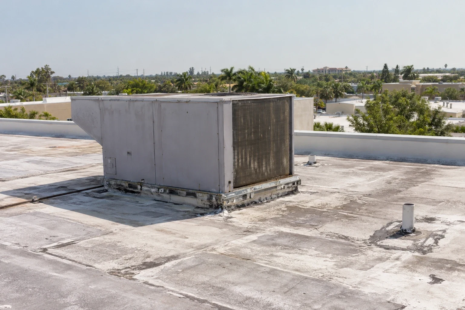 Occupied Commercial Building Reroofing in Pearland, TX